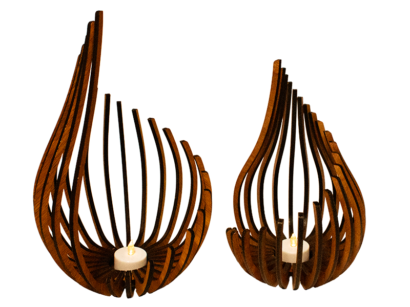 Tea light holder made of wood in the shape of a flame.