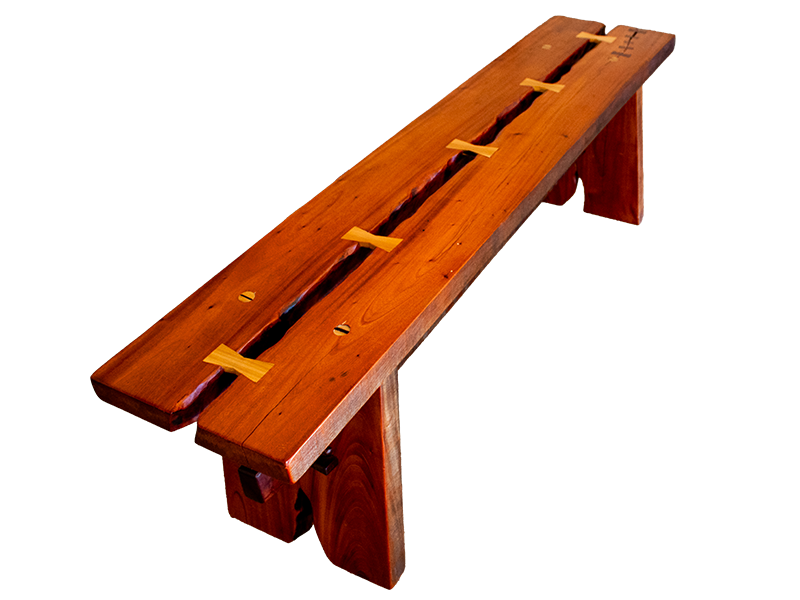 Mahogony split top bench using traditional joinery, with Maple and Purple Heart bowtie inlays, top view
