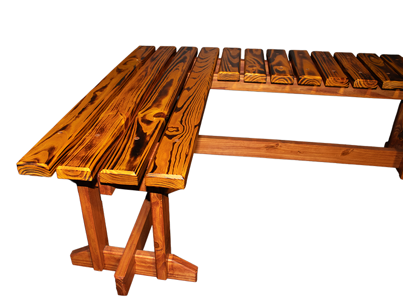 L-shaped slatted pine bench with amber top and dark walnut-stained base.