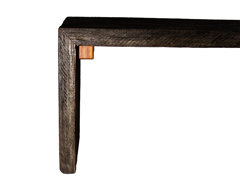 Weathered mahogany waterfall bench with sculpted split leg and purple heart accents. Split leg end view. Waterfall edge view.