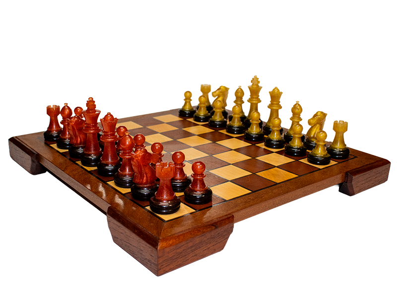 Chess Board made of Mohogany and Hard Maple, including black resin lines bordered with Ipe and Spanish Cedar feet.